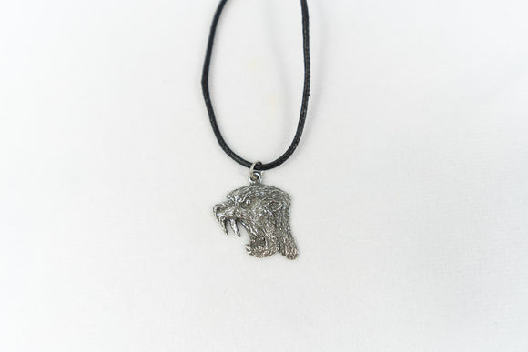 Sabre-toothed cat pendant